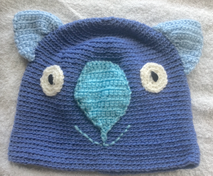 L. Wombat Beanie, hat  100% WOOL  Adults Women & smaller men : blue sky