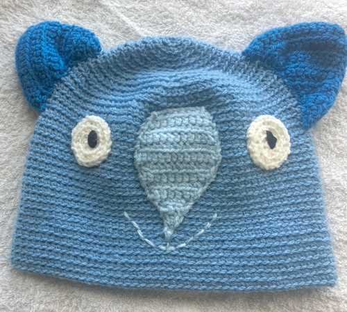 L. Wombat Beanie, hat  100% WOOL Most Adults Women & smaller men: Light blue teal