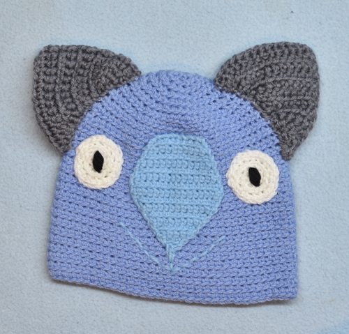 C 2 - 6. Wombat Beanie, hat  100% Wool Child 2 - 6 yrs   Blue, sky, grey