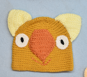 C 2 - 6. Wombat Beanie, hat  100% Wool Child 2 - 6 yrs Gold, orange lemon