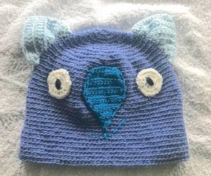L. Wombat Beanie, hat  100% WOOL  Adults Women & smaller men : Blue teal sky