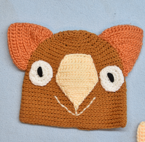 C 2 - 6. Wombat Beanie, hat  100% Wool Child 2 - 6 yrs   Rust Cream, orange  (Copy)