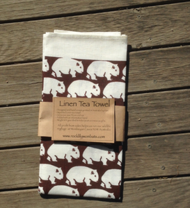 A Wombat Brown Print on white Linen tea towel made in Australia