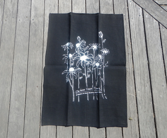 Flannel Fower Print on black Linen Tea Towel made in Australia