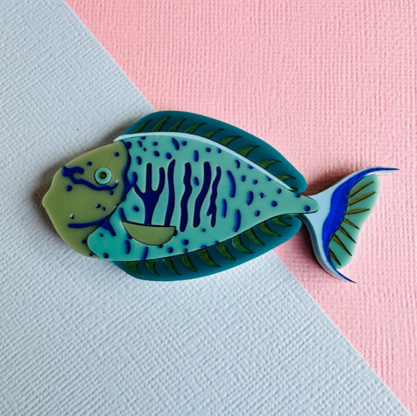 Big Nose Unicorn  Fish  Brooch  by Mox + co in store