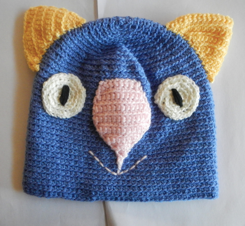 D. Wombat Beanie, hat   100% wool 7 - 12 yrs Extra Small Adult: Blue yellow