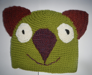 C 2 - 6. Wombat Beanie, hat  100% wool Child 2-6 yrs :  Green  brown