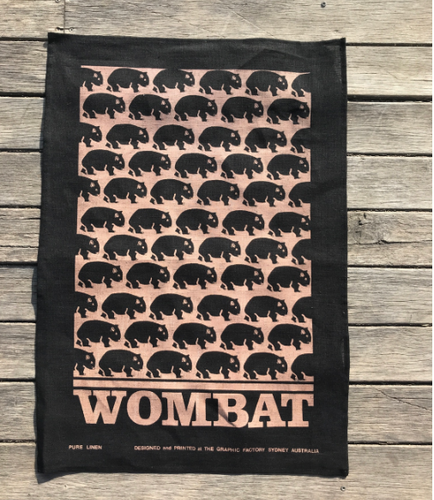 A Wombat Print coffee on black Linen Tea Towel made in Australia